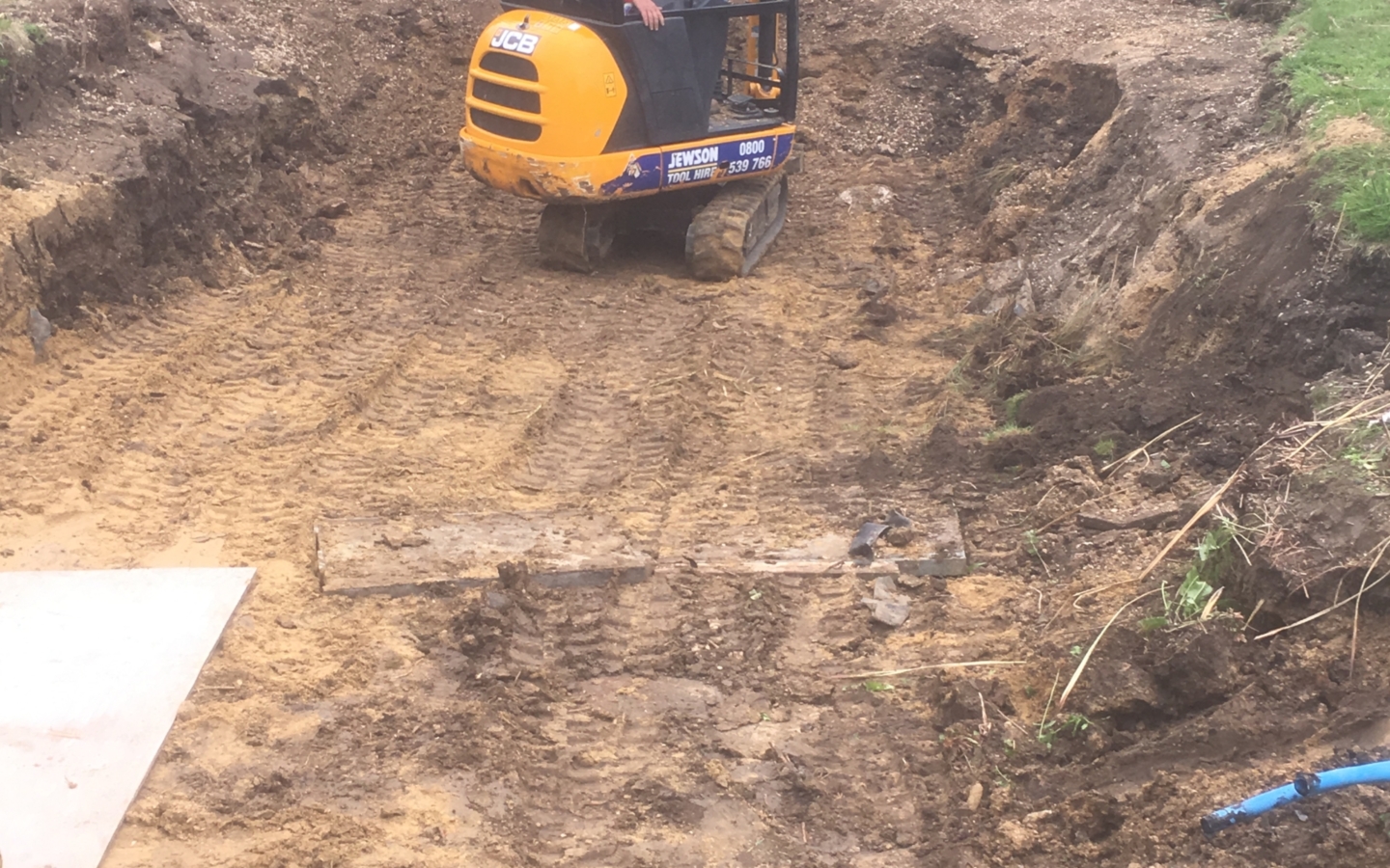 Exterior works swimming pool returned to lawn