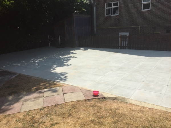 Exterior works care home decking replaced with paving