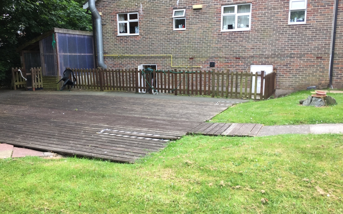 care home decking before replaced with paving