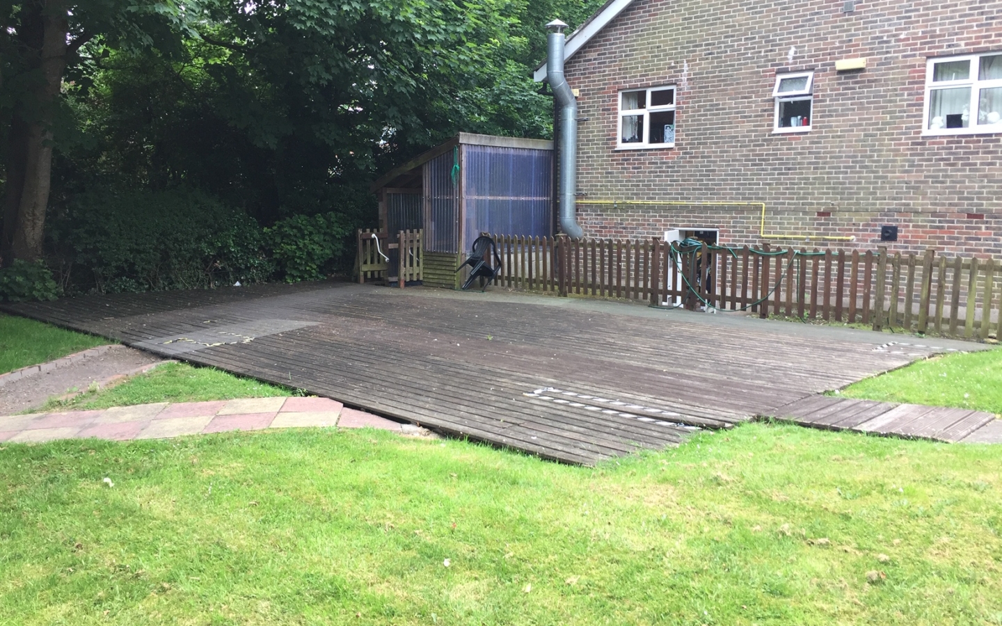 care home decking before replaced with paving